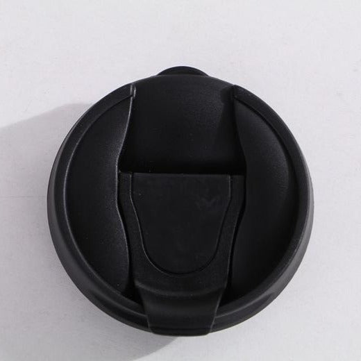 Travel mug lid.