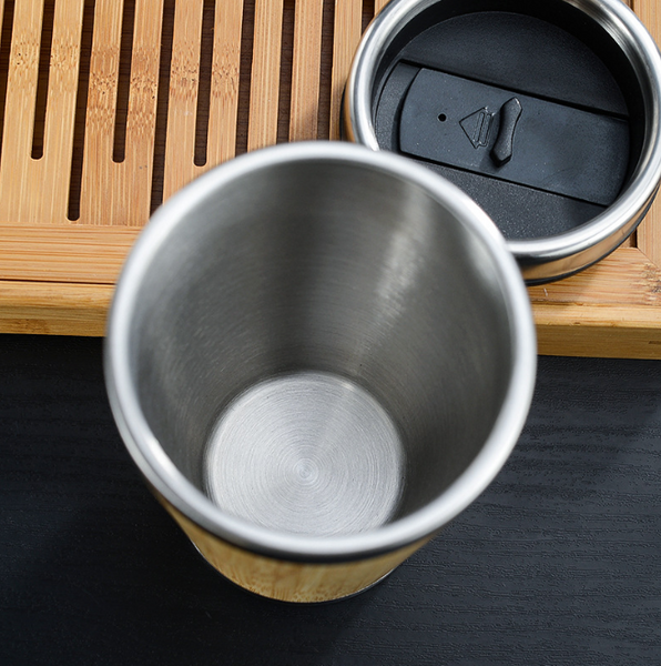 Stainless steel thermos flask.