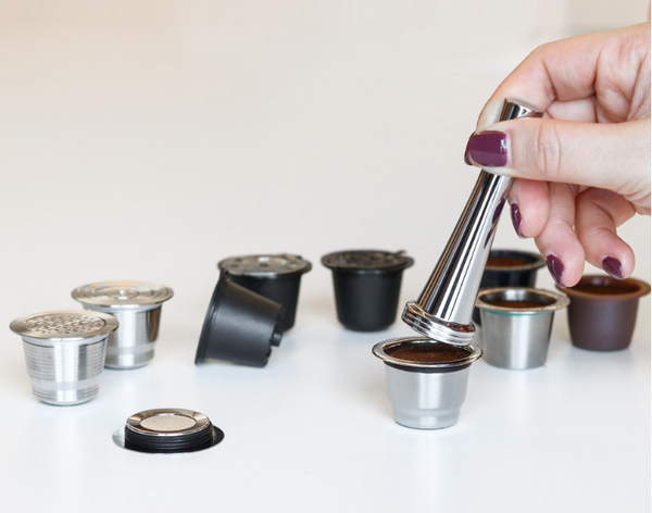 Tamper and nespresso pod.