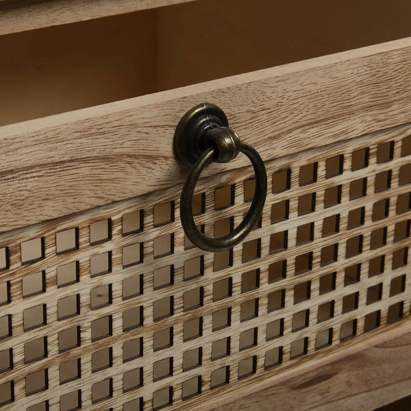 Chest of drawers with metal handles.