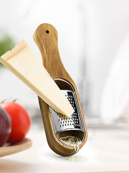 Vintage handheld cheese grater.