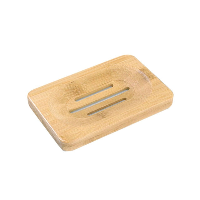 Rectangular bamboo soap dish with rounded edges.