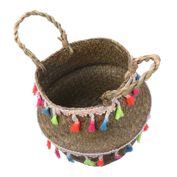 Handmade seagrass storage basket with colourful tassels.